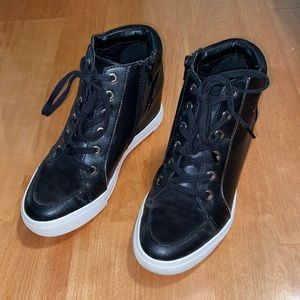 Black wedged sneakers by Aldo